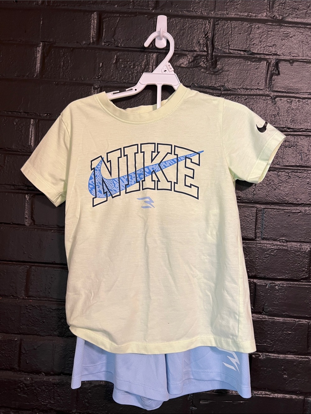 Nike Light Green Tee with Blue Swoosh Graphic